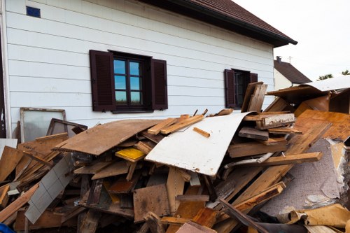 Team members providing residential loft clearance services