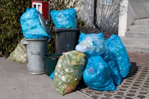 Workers sorting construction waste materials